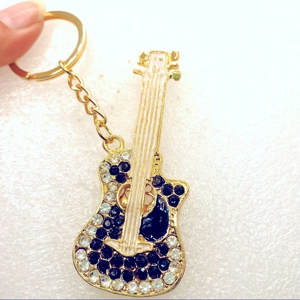 NWT Purse charm key holder Guitar Crystal in black and white